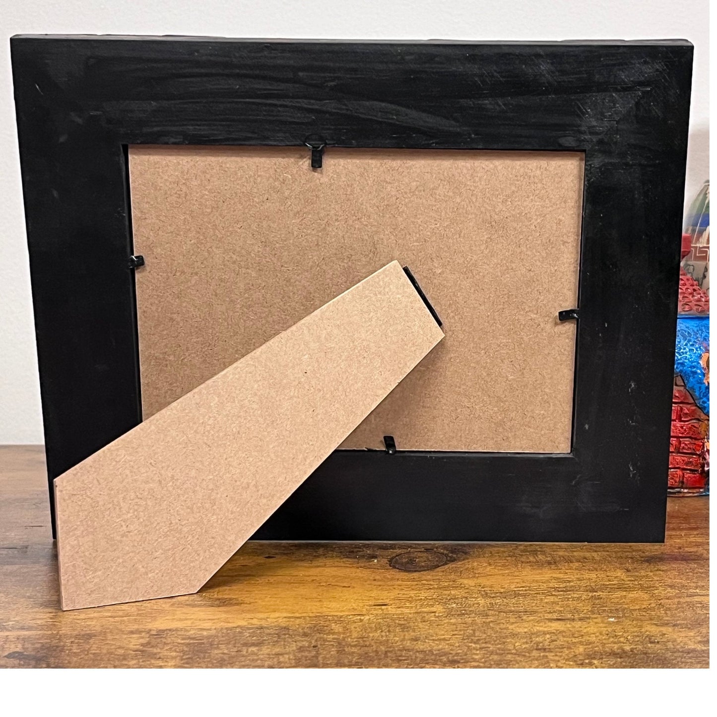 black painted back of frame, horizontal view