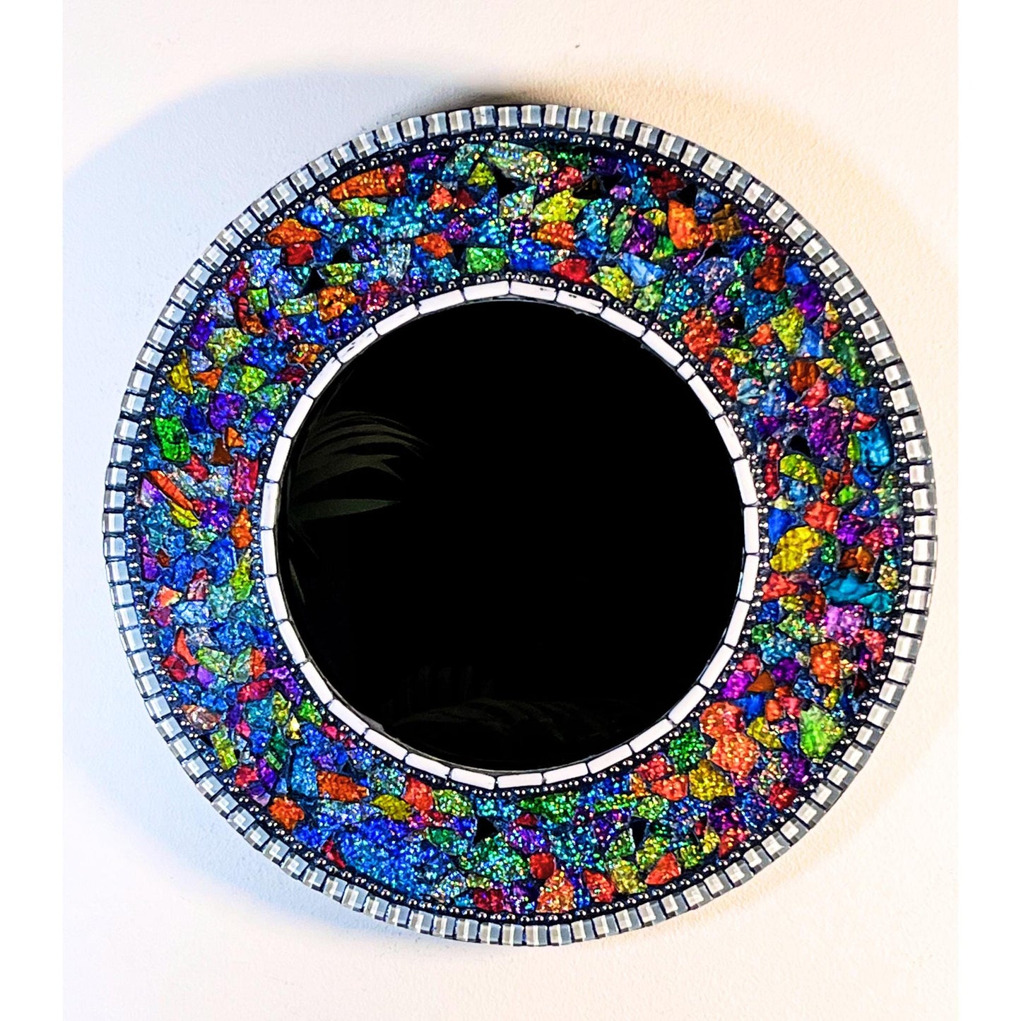 Front view:
14"Mirror frame with a rainbow of colors in tempered glass, laid side by side and grouted in a deep navy color wash