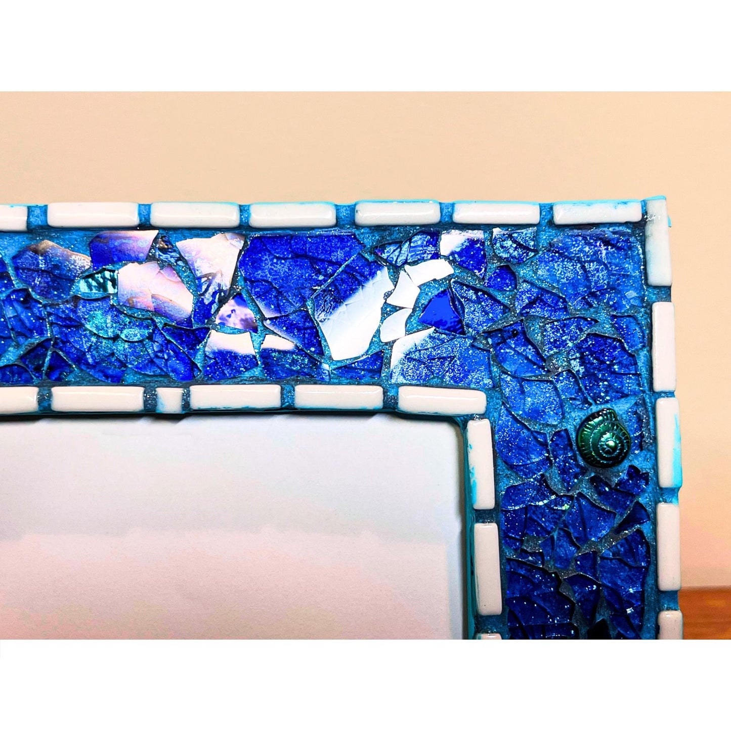 top right close up:
Blue Tempered glass and glitter background