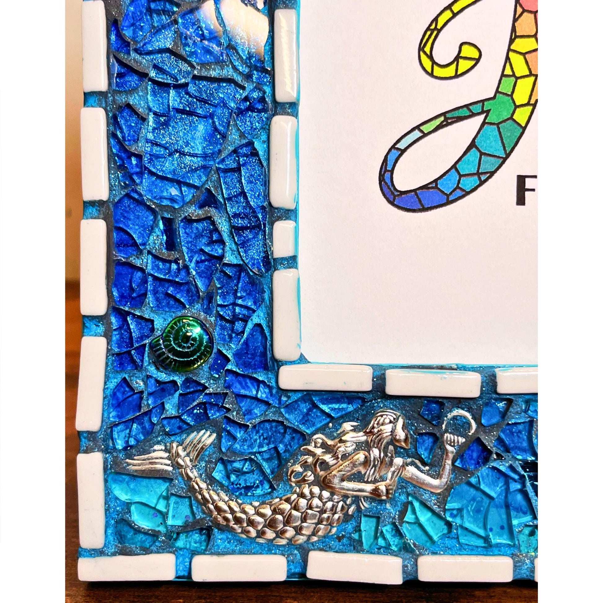 bottom left close up:
5 x 7 tempered glass and mosaic photo frame in shades of blue with silver mermaid charms on the bottom