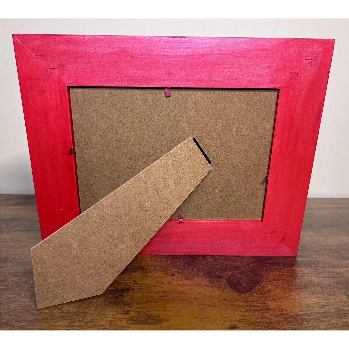 Back of frame painted red, horizontal view